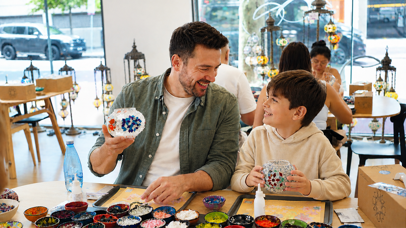 A father and child making Turkish mosaic lamps together