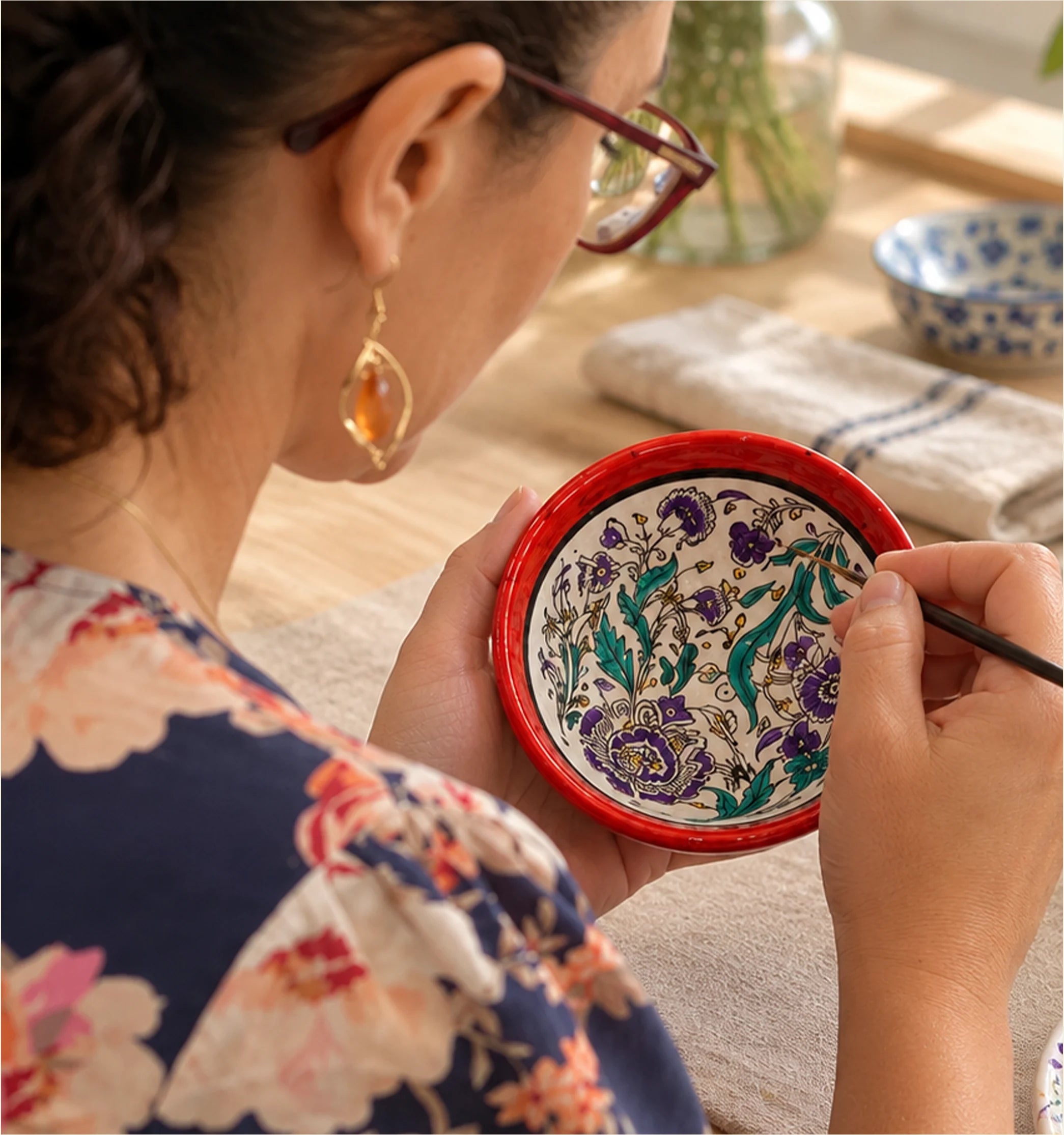 Painting a patterned ceramic bowl